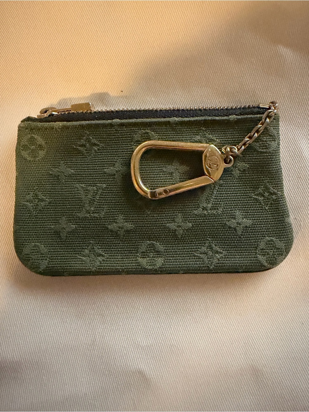 Louis Vuitton Mini Lin denim key pouch featuring gold-toned hardware